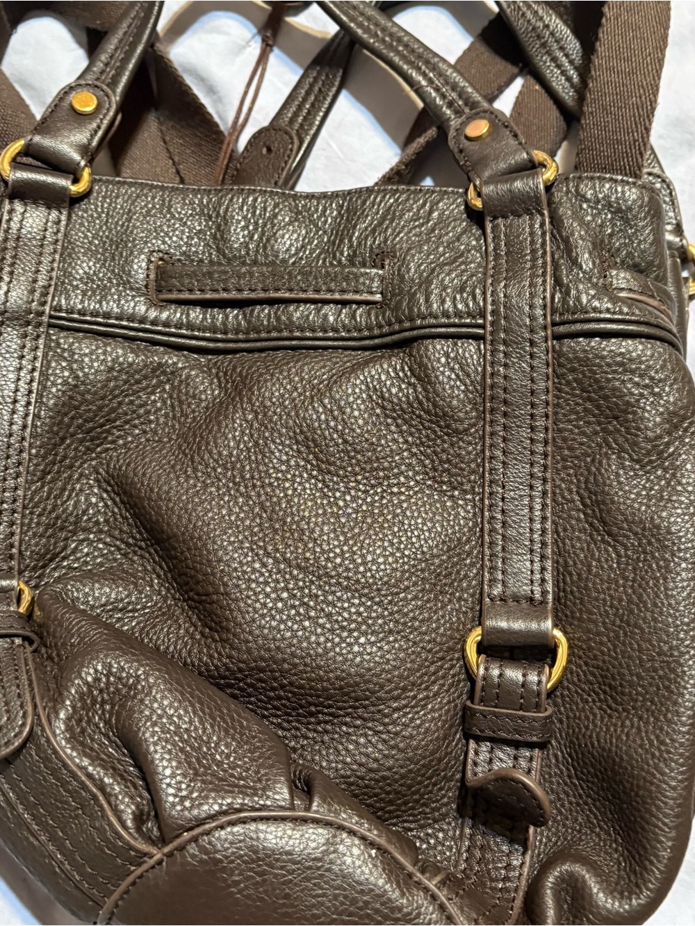 The Sak Dark Brown Pebbled Leather Shoulder Bag with Gold Hardware